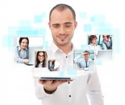 man holding laptop